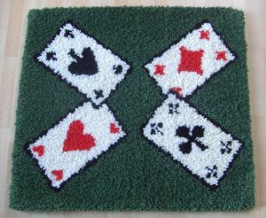 Jassteppich knüpfen aus Schurwolle und französische Kartensymbole